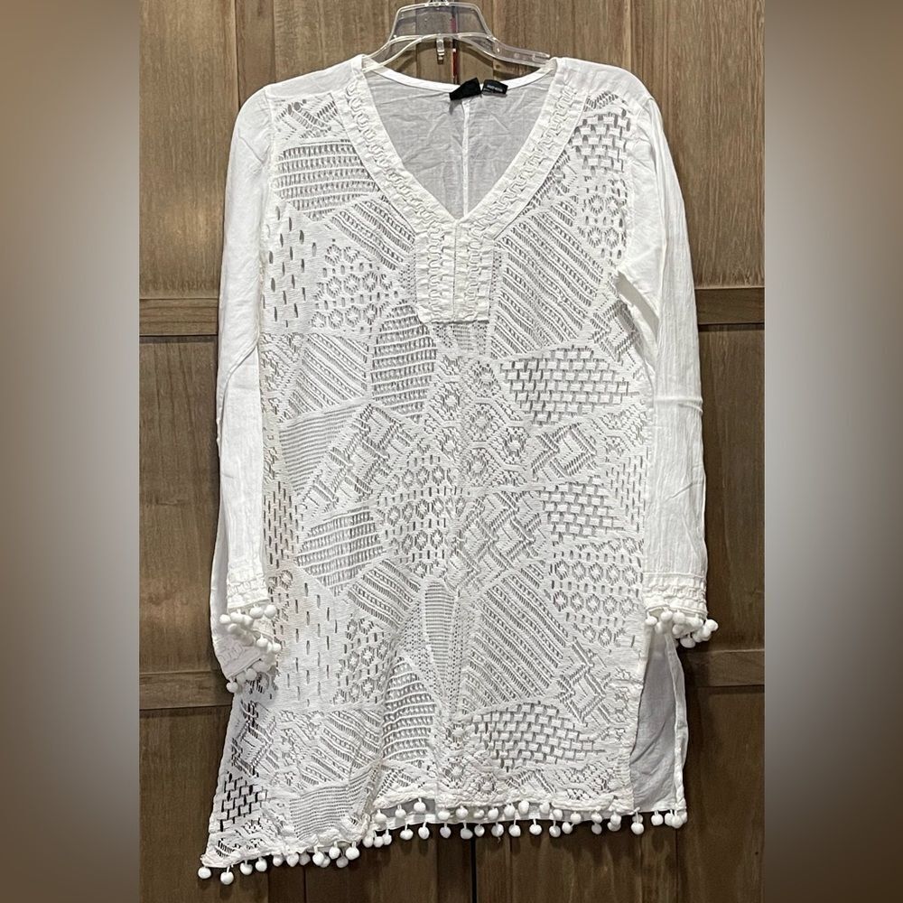 NWOT.  Beautiful lace long sleeve v neck swimsuit coverup.